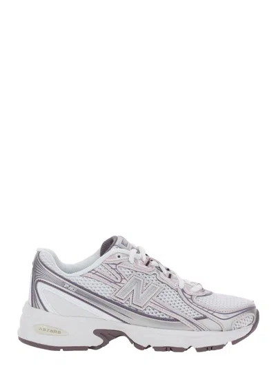 NEW BALANCE PINK LOW TOP SNEAKERS WITH LOGO PATCH ON SIDE AND TONGUE AND PERFORATED PANELS IN TECH FABRIC UNISEX