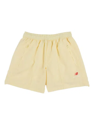 New Balance Pintuck Running Shorts In Yellow