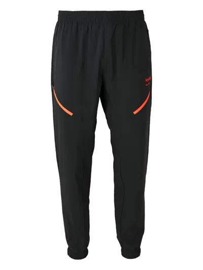New Balance Reimagined Woven Track Pants In Black