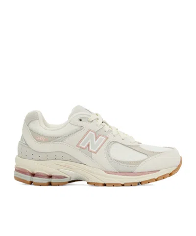 NEW BALANCE ROUND-HEAD SNEAKERS