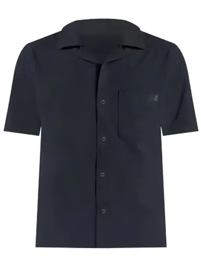 New Balance Shirts Man In Blue