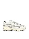 New Balance Grey Low Top Sneakers With Logo Patch On Side And Tongue And Perforated Panels In White