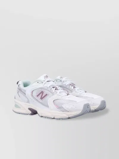 NEW BALANCE SNEAKERS LOW-COLLAR REAR PULL-TAB