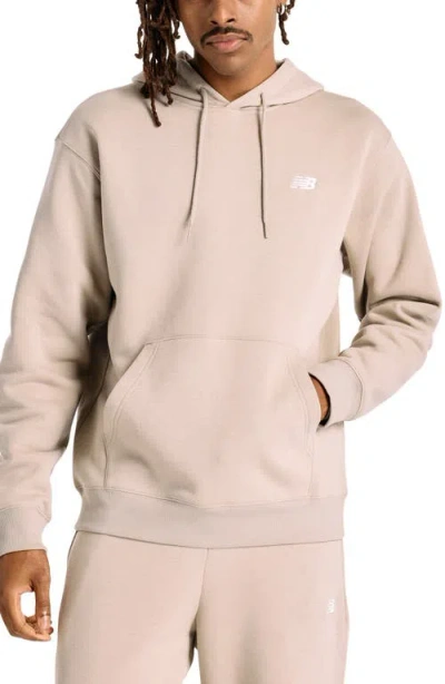 New Balance Sport Essentials Relaxed Fit Fleece Pullover Hoodie In Pink