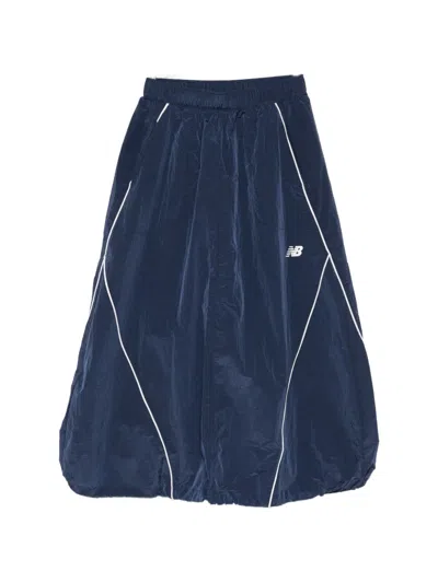 New Balance Sport Legacy Drawstring Logo Skirt In Blue