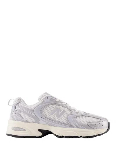 New Balance Sporty Mesh Sneakers With Reflective Details In Silver