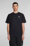 Shop New Balance T-shirt In Black Cotton