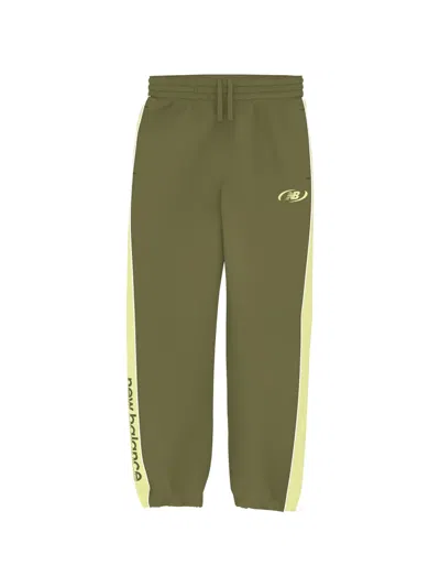 New Balance Trackside Woven Pants In Green