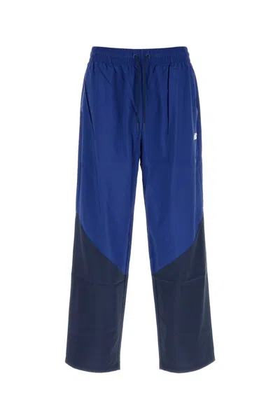 New Balance Two-tone Nylon Joggers In Blue