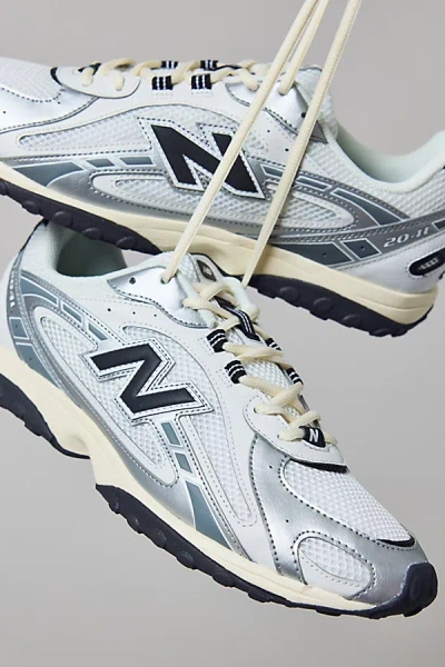 New Balance Unisex 204l Sneaker In Silver Metallic/black At Urban Outfitters In Multi