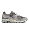 New Balance Layered Mesh And Suede Sneakers With Retro Aesthetic In Gray