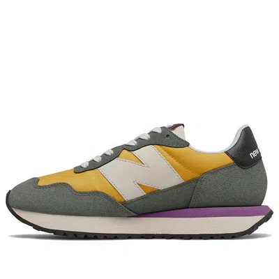 New Balance Women's 237 In Gold/green