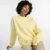 New Balance Women's Sport Essentials French Terry Crew Shirt In Yellow