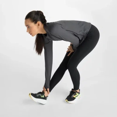 New Balance Women's Athletics Heat High Rise Legging 27" In Black