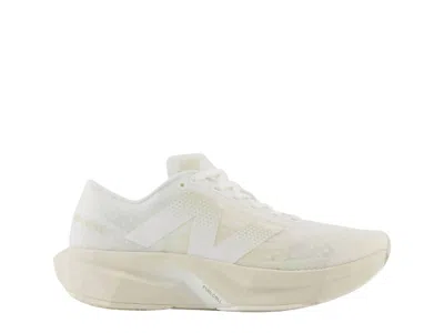 New Balance Women's Fuelcell Rebel V4 Shoe In White/linen/sea Salt