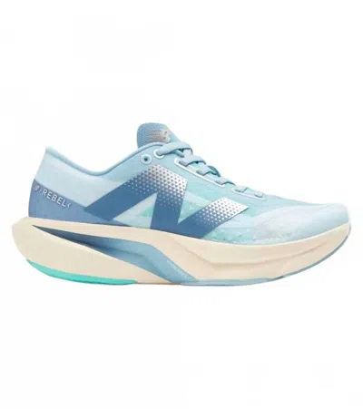 New Balance Women's Fuelcell Rebel V4 Shoes In Quarry Blue/chrome Blue/heron