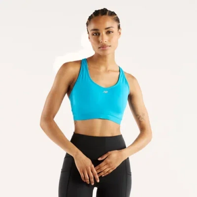 New Balance Women's Nb Essential Run Bra In Blue Poly Knit, Size Medium
