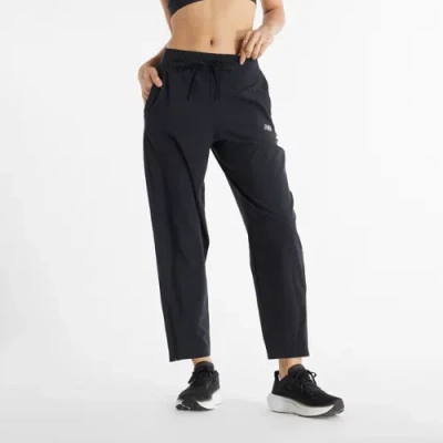 New Balance Women's Sport Essentials Performance Woven Pant In Black
