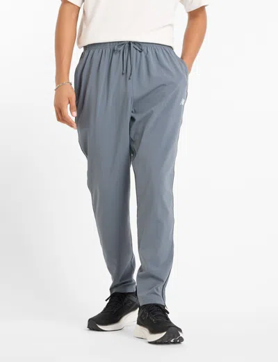 New Balance Women's Sport Woven Pant In Blue