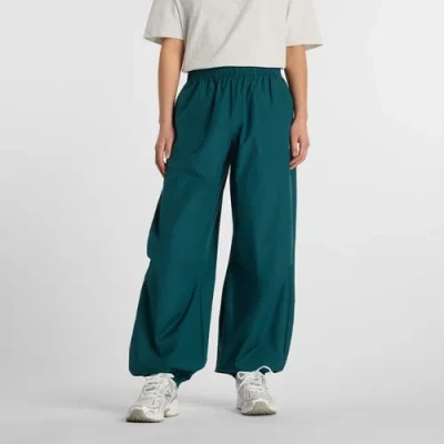 New Balance Women's Trackside Woven Pant In Green