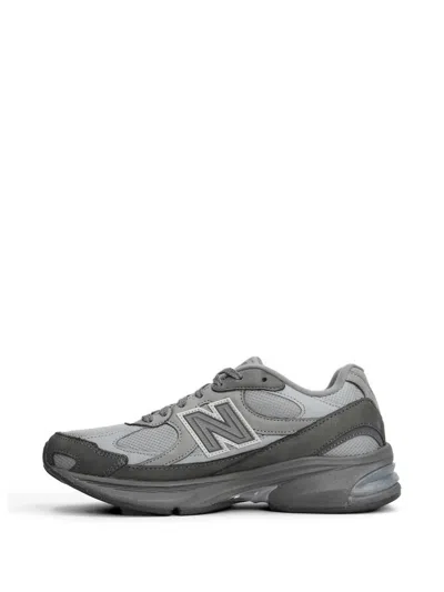 New Balance X Comme Des Garçons Homme Panelled Logo-patch Sneakers In Gray