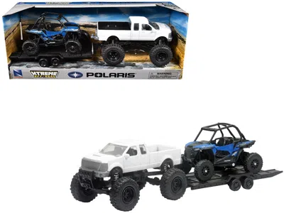 New Ray Lifted Pickup Truck White And Polaris Rzr Xp Turbo Blue With Flatbed Trailer "xtreme Off-road" Serie