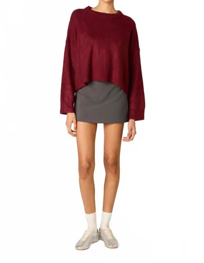 Nia Ariana Wide Ribbed Knit Sweater In Pinot In Red