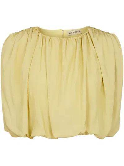 NICHOLAS NADIRA TOP