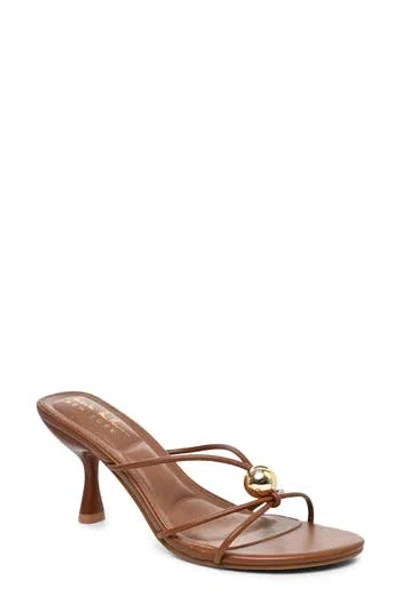 Nicole Miller Rolled Strap Heeled Sandal In Brown