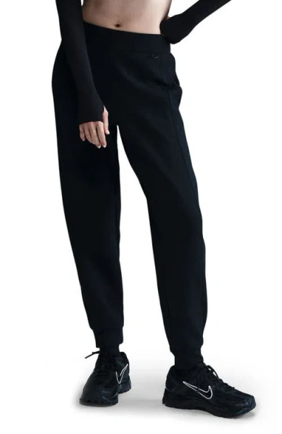 Nike 24.7 Dri-fit Mid-rise Joggers In Animal Print