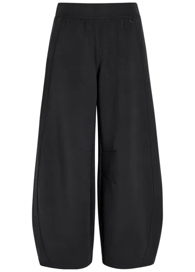 Nike 24.7 Wide Barrel-leg Impossiblysoft Jersey Sweatpants In Black