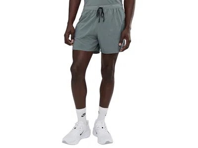 Nike 5 Dri-fit Stride Brief-lined Shorts In Green