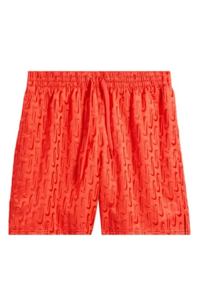 Nike 7-inch Swoosh Embroidered Swim Trunks In Light Crimson