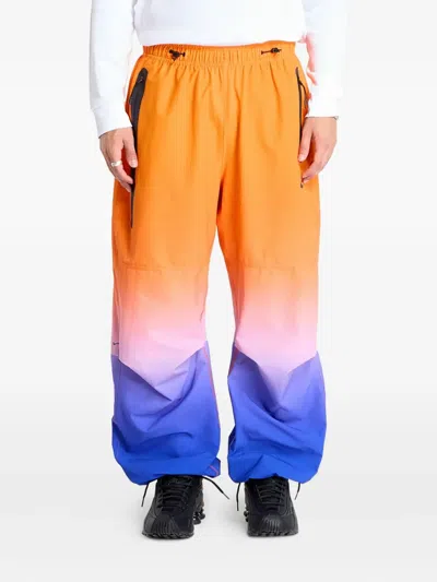 Nike Adjustable Woven Trousers In Orange