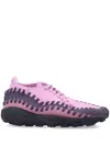 Nike Woven Footscape Sneakers Featuring Asymmetrical Lacing In Pink