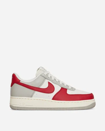 NIKE AIR FORCE 1  07 LV8 SNEAKERS PHANTOM / GYM RED