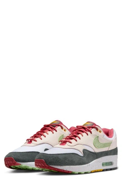 Nike Air Max 1 Sneaker In Lt Soft Pink/vapor Green-anthracite-adobe-univ Gol