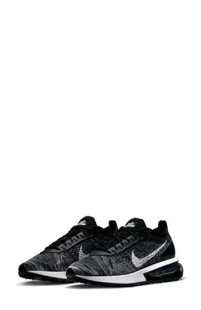 Nike Air Max Flyknit Racer Sneaker In Black/white