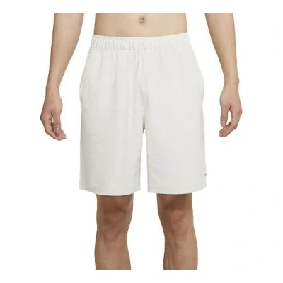 NIKE NIKE AS MEN'S NK YOGA CORE SHORT LIGHT BONE
