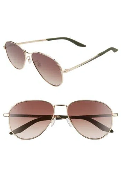 Nike Ascendant 57mm Tinted Aviator Sunglasses In Gold/cargo Khaki/brown Grad