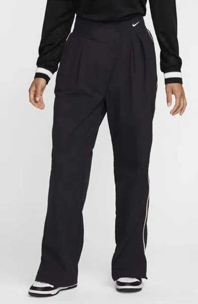 Nike Asymmetric Waist Water Repellent Pants In Animal Print