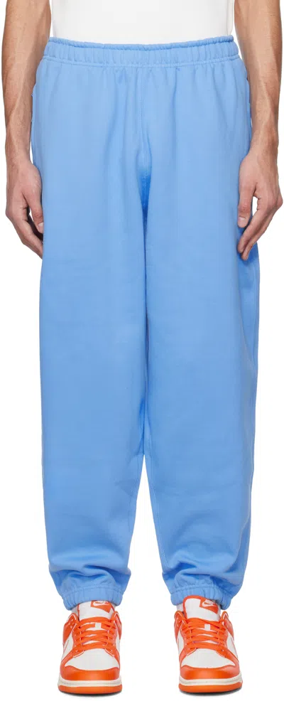 Nike Blue Solo Swoosh Sweatpants In University Blue/whit