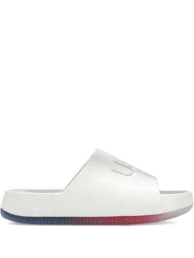 NIKE CALM EMBOSSED SLIDE