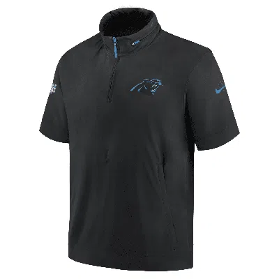 Nike Carolina Panthers Sideline Coach  Men's Nfl 1/2-zip Short-sleeve Hooded Jacket In Black