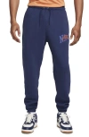 Nike Club Fleece Sweatpants In Midnight Navy/ Safety Orange