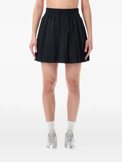 Nike Club Rules Pleated Skirt In Black