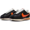 Nike Cortez Txt Sneaker In Black/sail/safety Orange