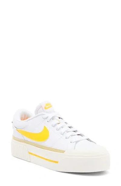 Nike Court Legacy Lift Platform Sneaker In White/ Orange/ Gold