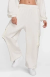 Nike Women's  Sportswear Low-rise Oversized French Terry Open-hem Pants In Sail/black