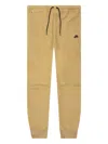 Nike Drawstring-waistband Track Pants In Yellow